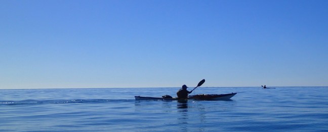 glassy paddle across Sandy Strait